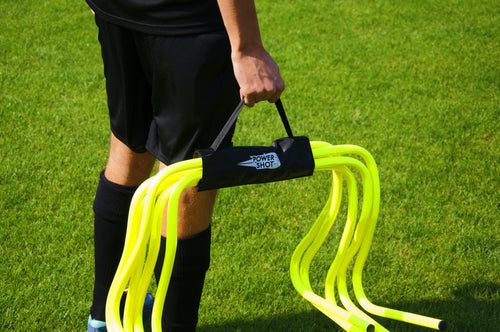 Carrying handle for hurdles and slalom poles